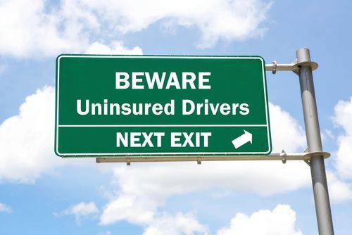 Uninsured drivers road sign